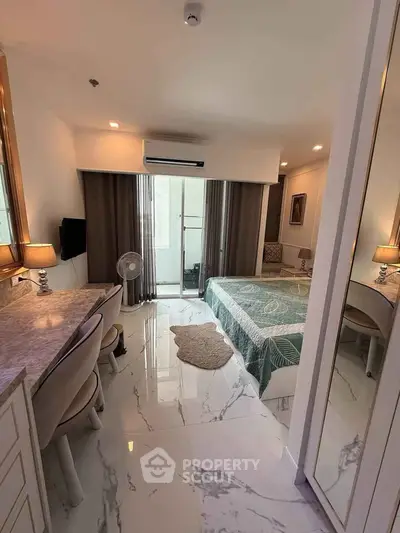 Modern bedroom with marble flooring and elegant decor
