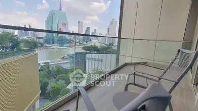 Spacious balcony with stunning cityscape and river view, perfect for relaxation.