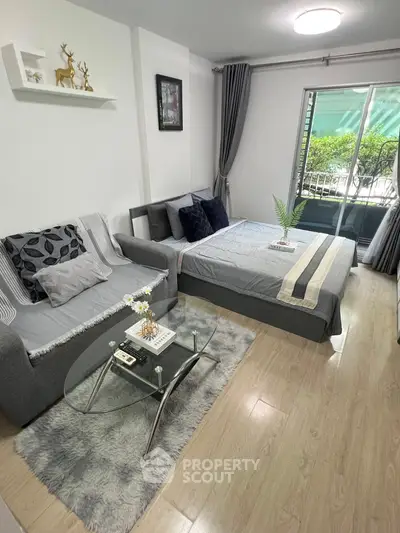 Cozy studio apartment with modern decor and natural light