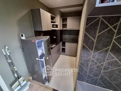 Modern kitchen with sleek cabinets and stainless steel appliances
