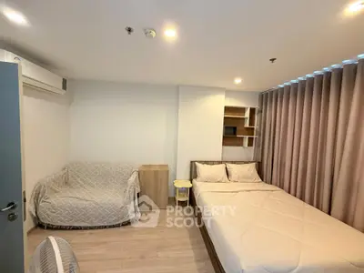 Cozy bedroom with modern decor and natural light