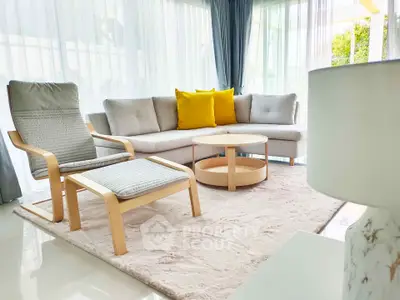 Bright and modern living room with cozy seating and natural light