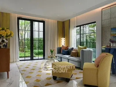 Luxurious living room with modern decor and garden view, featuring elegant furniture and large windows.