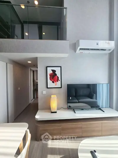 Modern living room with stylish decor and mezzanine level