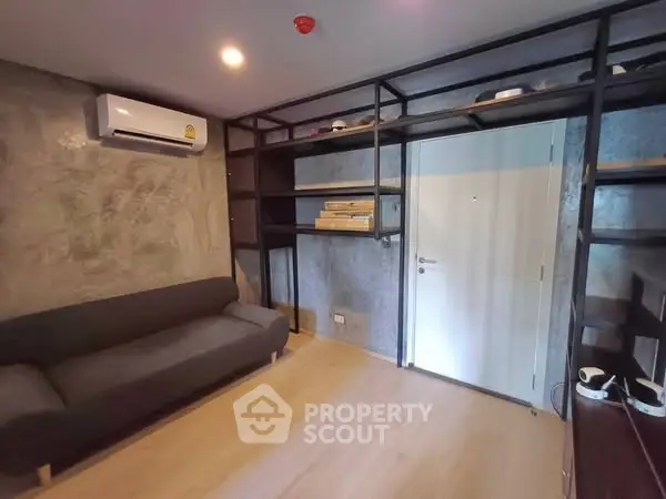 Modern living room with sleek shelving and air conditioning