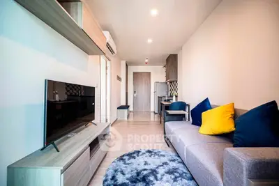 Modern living room with stylish decor and open layout in a contemporary apartment.