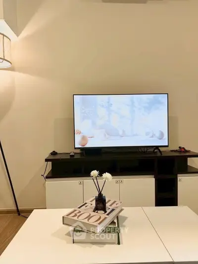 Modern living room with sleek TV setup and stylish decor