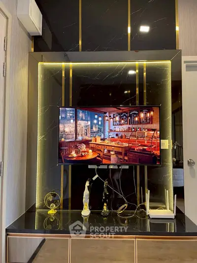 Luxurious living room with modern TV setup and elegant decor