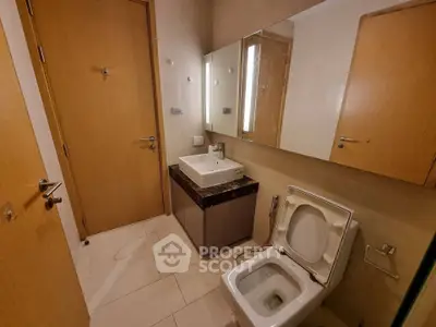 Modern bathroom with sleek fixtures and elegant design in a contemporary home.