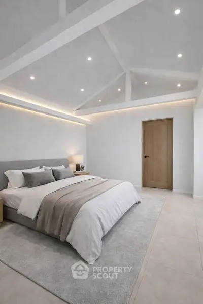 Luxurious modern bedroom with vaulted ceiling and cozy lighting