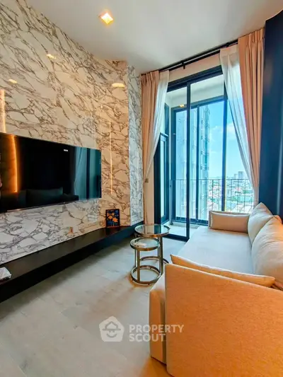 Luxurious living room with marble accent wall and city view balcony in modern apartment.