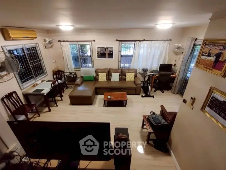 Spacious living room with modern furniture and natural light