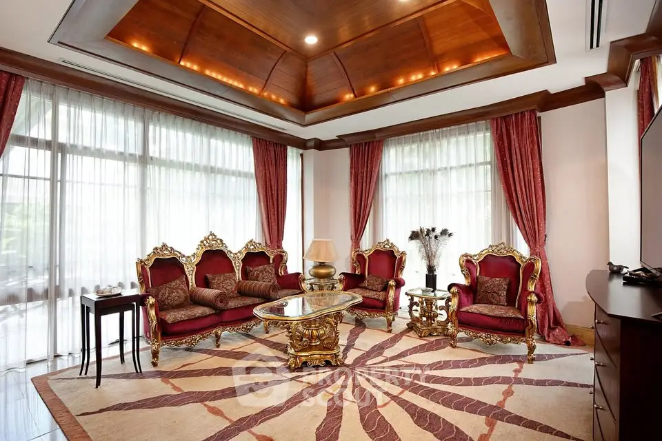 Luxurious living room with elegant furniture and high ceiling design