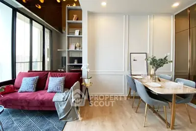 Modern living room with elegant dining area and stylish decor