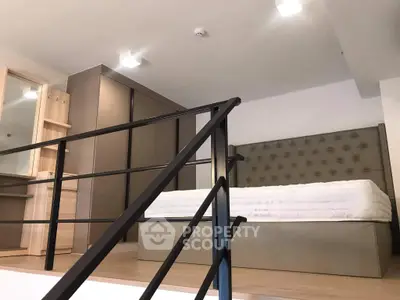 Modern bedroom with stylish bed and ample storage space