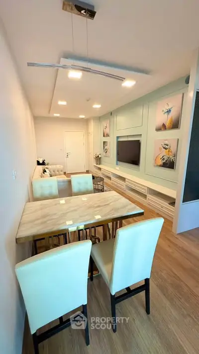 Modern living room with elegant dining area and stylish decor