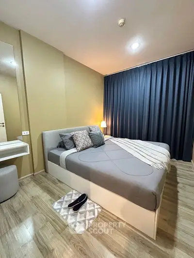 Modern bedroom with stylish decor and cozy ambiance