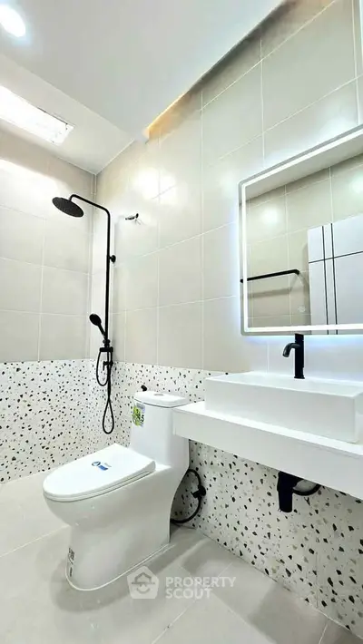 Modern bathroom with sleek fixtures and stylish tile design