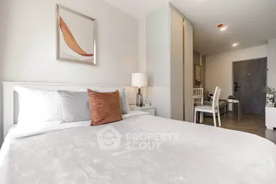 Modern bedroom with stylish decor and cozy ambiance