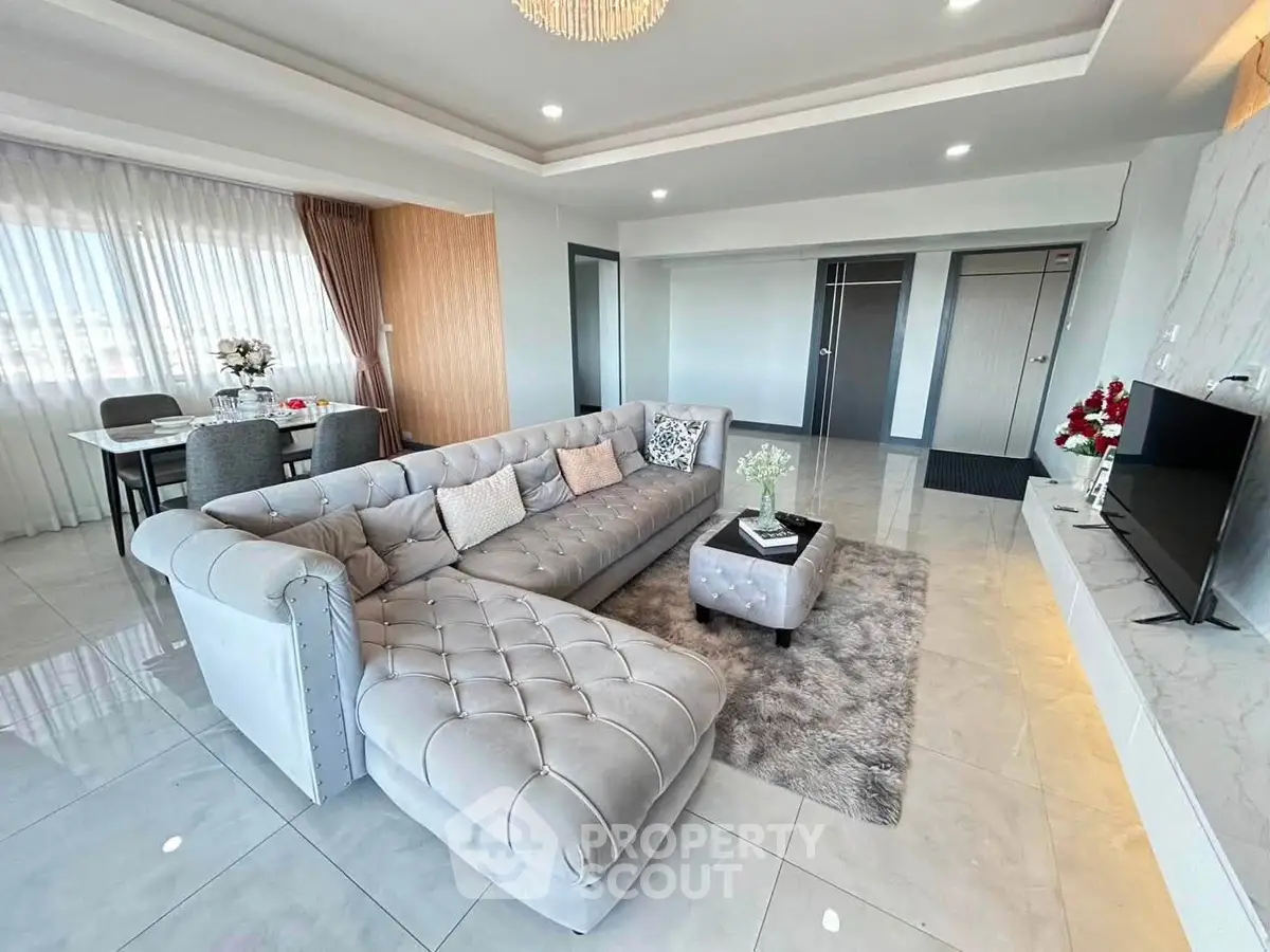Luxurious modern living room with elegant decor and spacious layout