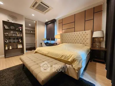 Luxurious bedroom with elegant decor and spacious walk-in closet