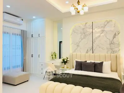 Luxurious bedroom with elegant decor and modern furnishings