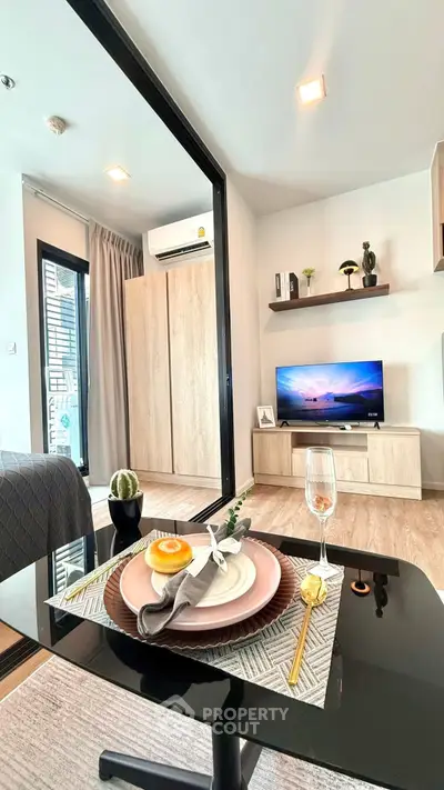 Modern living room with stylish decor, open layout, and natural light, perfect for urban living.