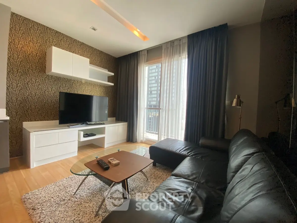 Modern living room with stylish decor and large window view
