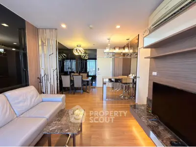 Modern living room with elegant lighting and comfortable seating