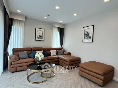 Luxurious living room with elegant leather sofa and chic decor in modern apartment