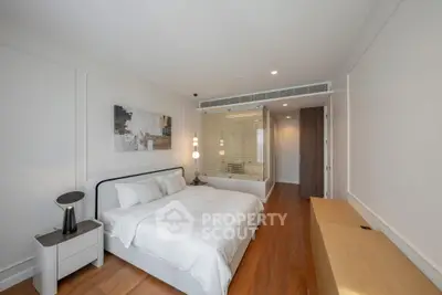 Modern bedroom with elegant decor and wooden flooring