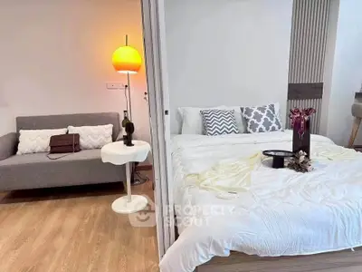 Modern studio apartment with cozy bedroom and stylish living area