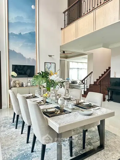 Luxurious dining room with elegant decor and high ceilings in a modern home