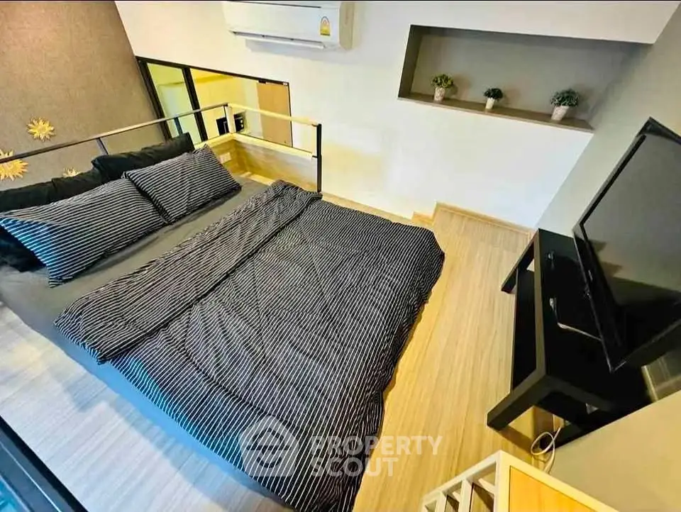 Modern loft bedroom with stylish decor and cozy ambiance