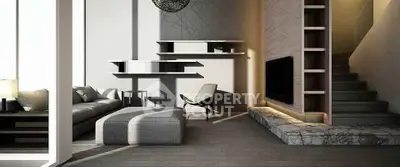 Modern living room with stylish furniture and elegant staircase design