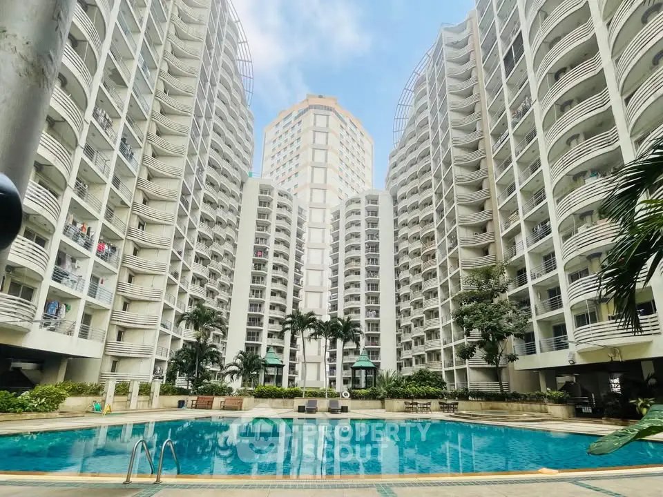 Luxurious residential complex with stunning pool and modern architecture