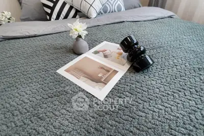Cozy bedroom with stylish decor and textured bedding