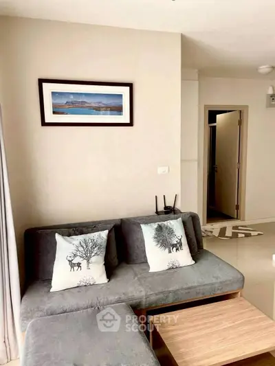 Cozy living room with modern decor and stylish furniture, perfect for relaxation and comfort.