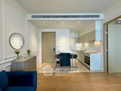 Modern open layout kitchen with sleek design and elegant decor