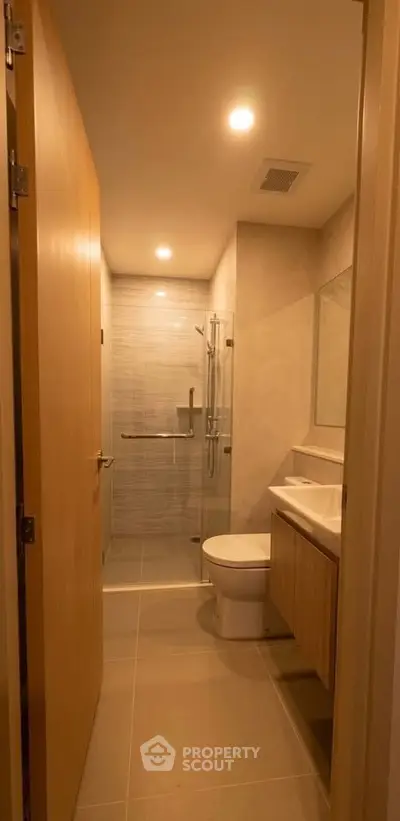 Modern bathroom with sleek design and glass shower enclosure