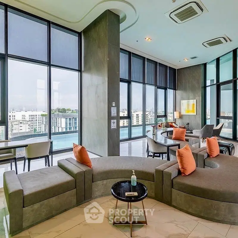Luxurious modern living room with panoramic city views and stylish furniture.