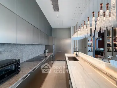 Luxurious modern kitchen with sleek cabinetry and elegant lighting