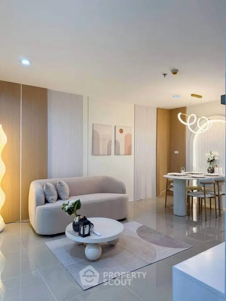 Modern living room with stylish decor and elegant dining area