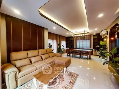 Luxurious living room with elegant lighting and spacious seating area