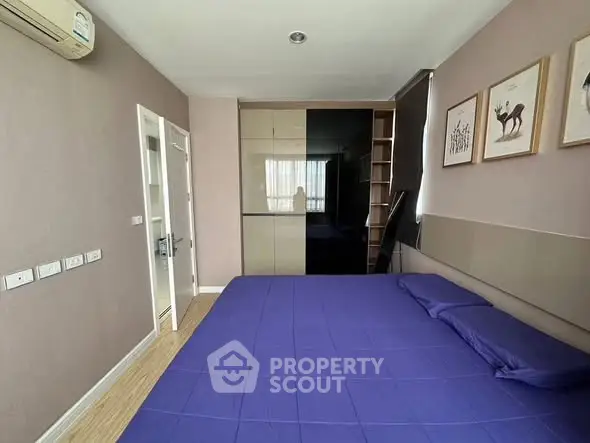 Modern bedroom with built-in wardrobe and stylish decor