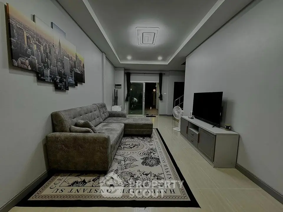 Spacious modern living room with stylish decor and comfortable seating