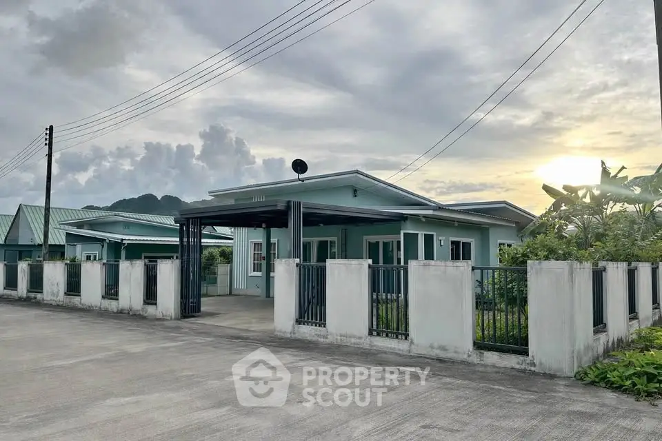 Charming single-story home with modern design and lush surroundings, perfect for serene living.