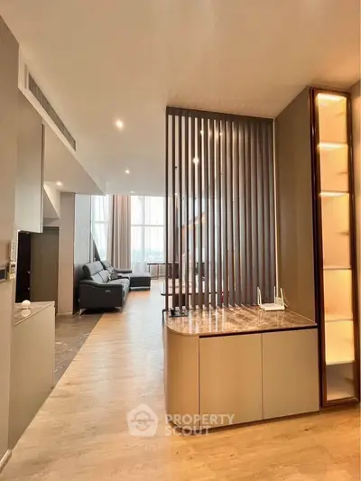 Modern living room with stylish partition and elegant decor