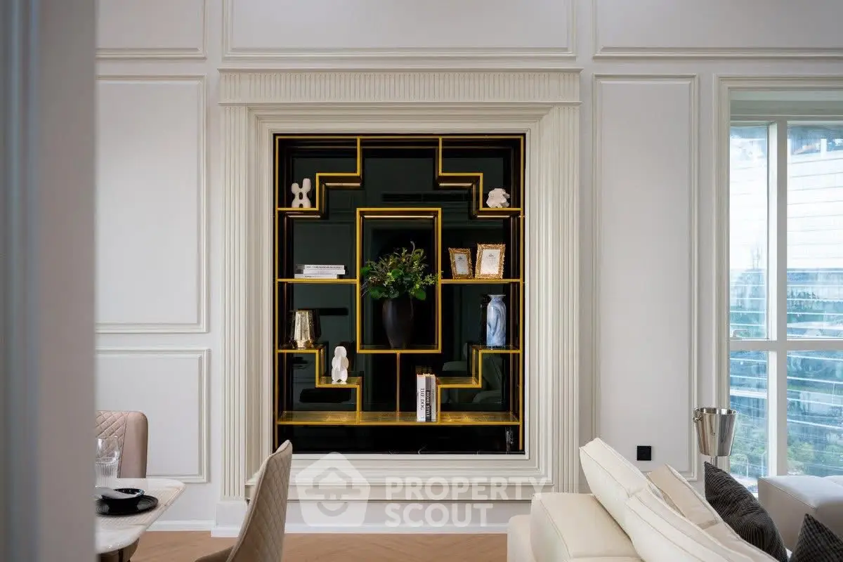 Elegant living room with modern shelving and large window view