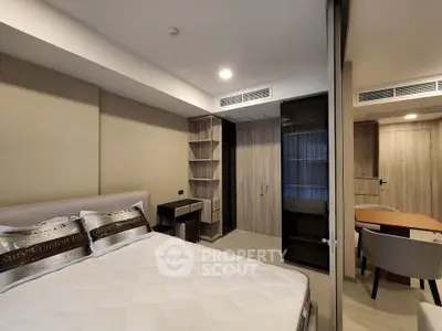 Modern bedroom with sleek design and built-in storage in luxury apartment